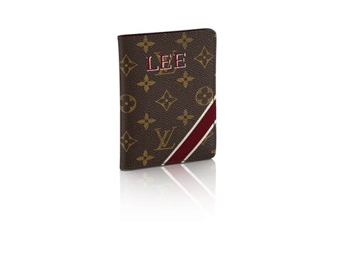 Designer Passport Cover in Monogram Canvas.